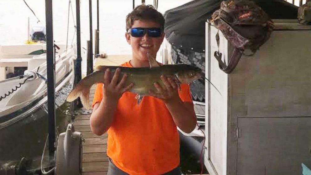 PHOTO: Brodie Brooks, 11, caught April Bolt's purse while fishing on Lake Hartwell in Anderson, S.C.