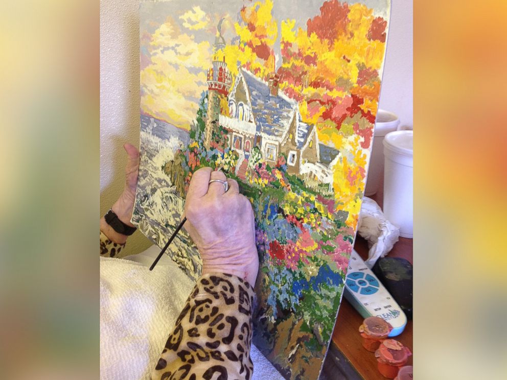 PHOTO: Joan Holland, 83, paints beautiful paintings to pass the time in assisted living.