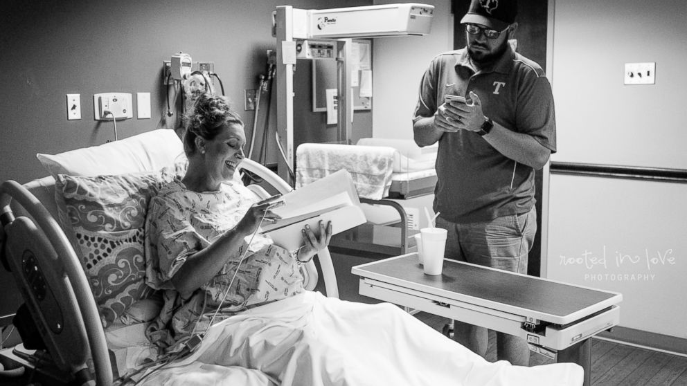 Jennifer Pope, 35, of Burleson, Texas, was completing paperwork on April 23 while in labor at Texas Health Harris Methodist Hospital in Fort Worth.
