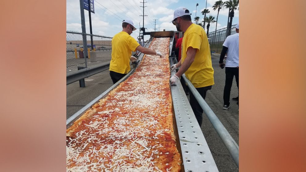 VIDEO: Mile-long pizza breaks world record and helps feed the homeless
