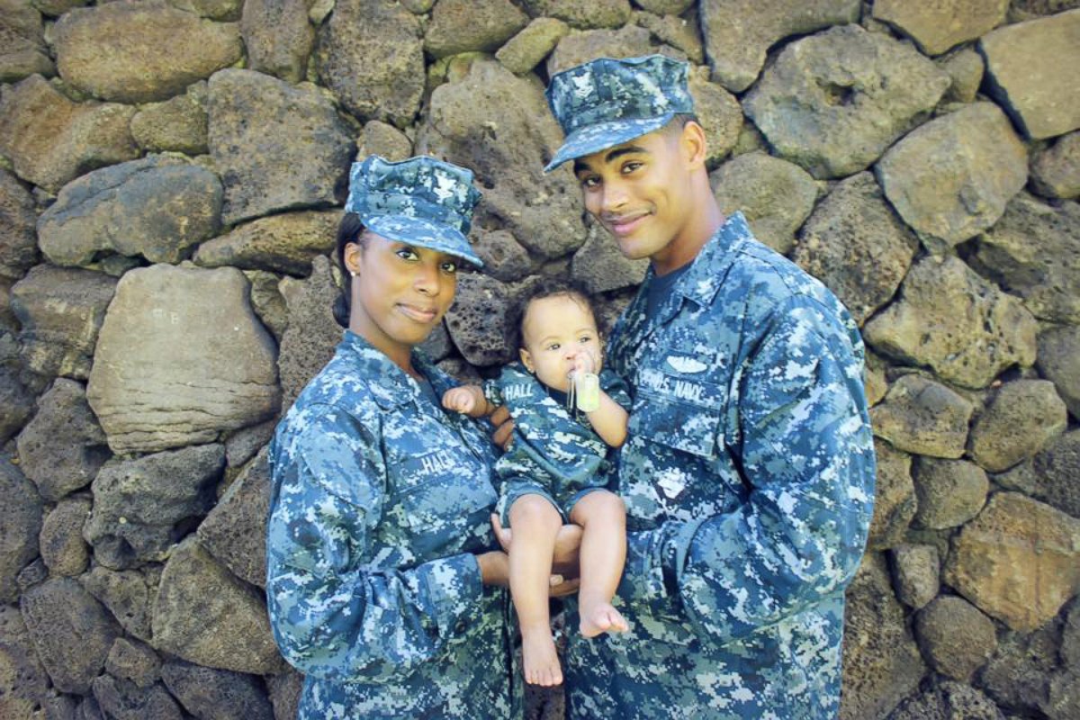 PHOTO: LeShaina Hall with her husband Lamarr, who is currently deployed in the Navy, with their 1-year-old daughter, Mia.