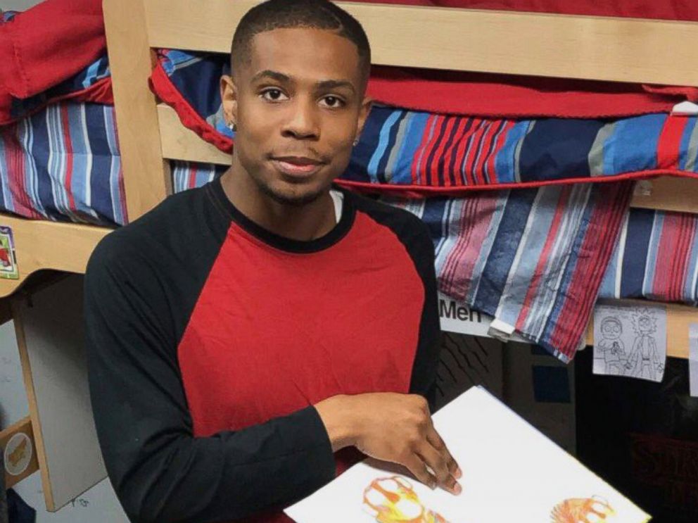 PHOTO: After University of Tennessee resident assistant Quamir Boddie asked his students what they needed to feel at home, he fulfilled Andrew Kochambas request of reading him a bedtime story.