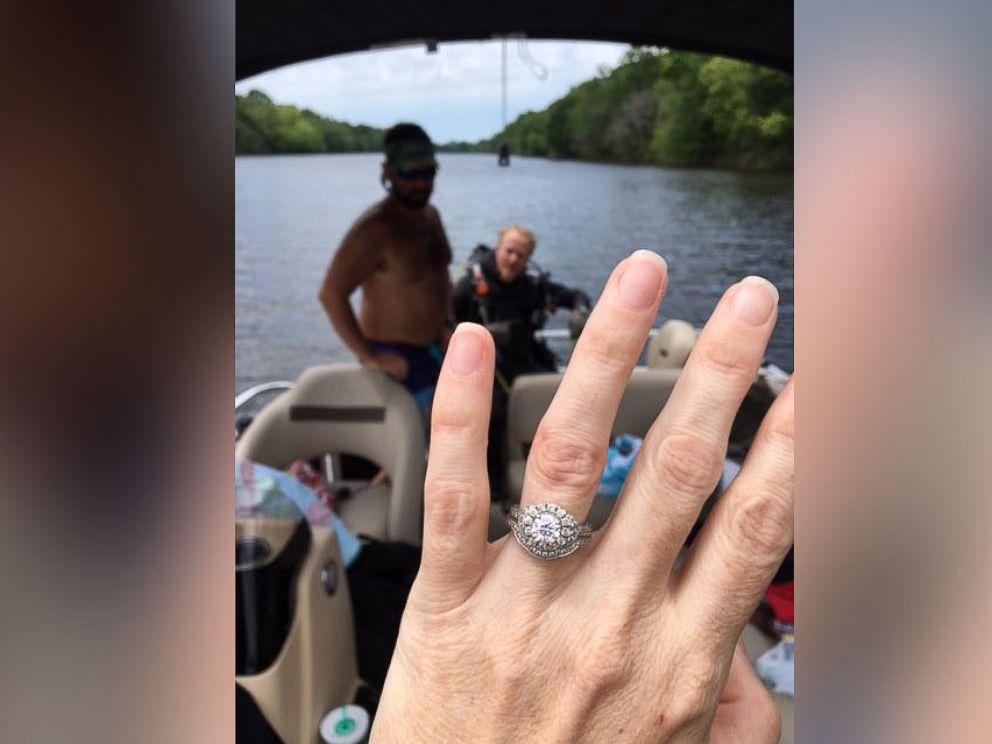 PHOTO: Spencer Phillips of Southern Skin Divers Supply helped a devastated Brooke Leavins find her engagement ring lost in Alabamas Coosa River.