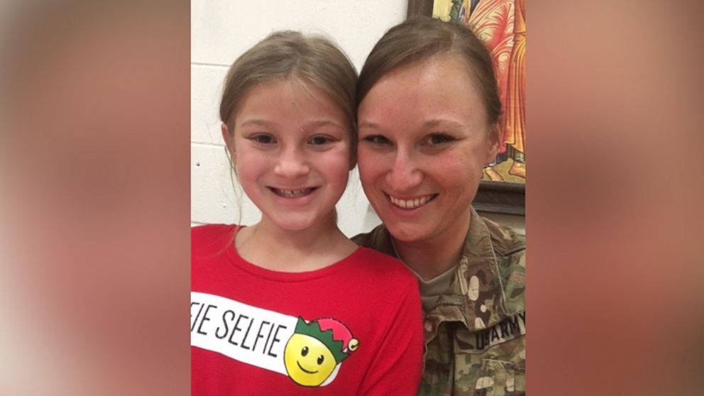 PHOTO: Christine Rainey, a specialist in the Army, returned home from her deployment in Qatar to surprise her daughter and her dance recital.