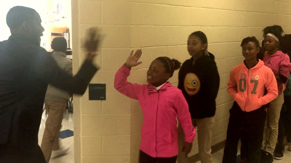 PHOTO: Barry White, Jr., a fifth grade teacher in Charlotte, North Carolina, personally shakes hands with every single one of his students. 
