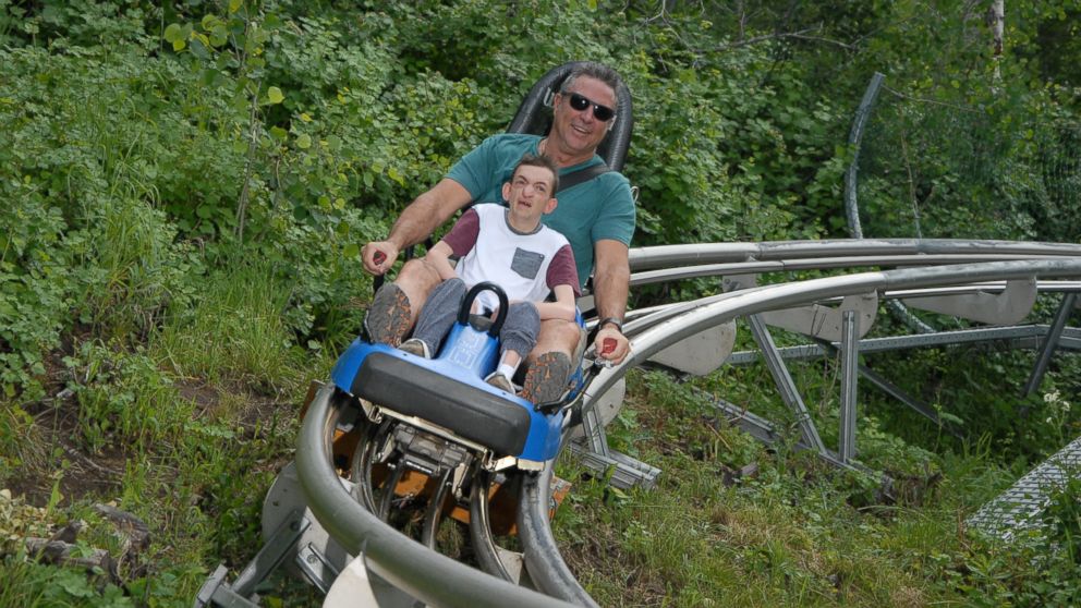 PHOTO: Chad Cloward, of Scottsdale, Arizona, and his special needs son Dallan celebrated his 30th birthday by going on a roller coaster.