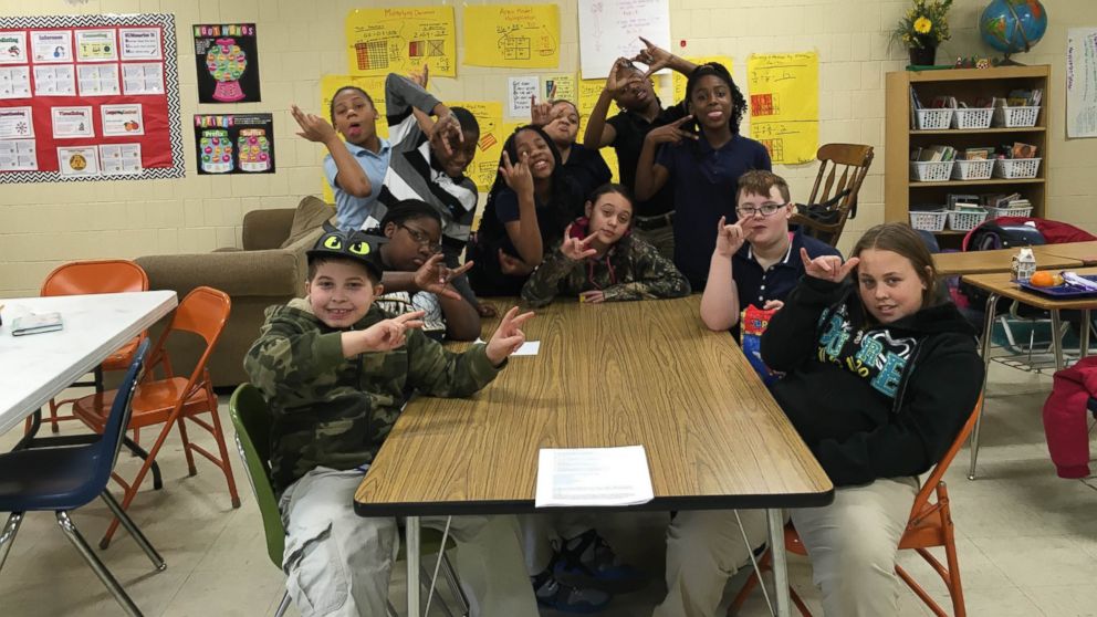 PHOTO: Students at Mark Bills Middle School in Peoria, Illinois created a sign language club to better communicate with a deaf student.