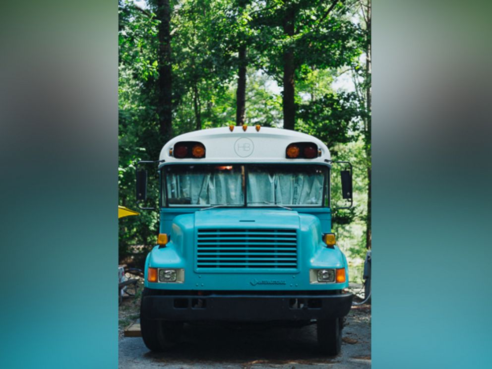 PHOTO: Andrew and Julie Puckett live inside of a 1990 Blue Bird bus that they transformed into their home with $1,000 of renovations. 