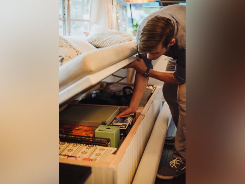 PHOTO: Andrew and Julie Puckett live inside of a 1990 Blue Bird bus that they transformed into their home with $1,000 of renovations. 