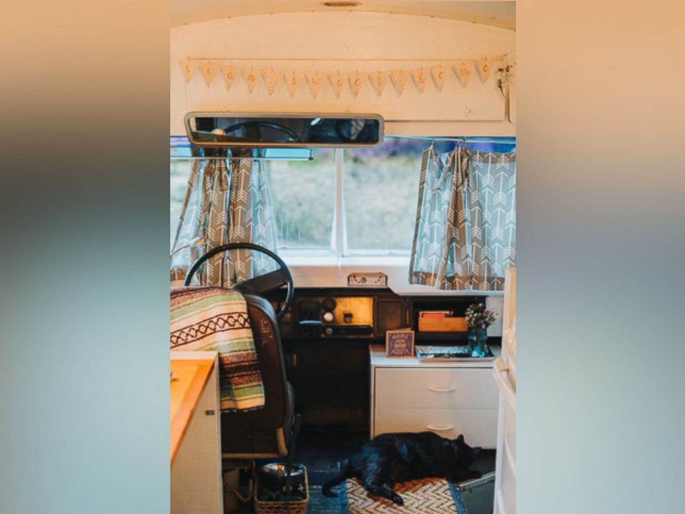 PHOTO: Andrew and Julie Puckett live inside of a 1990 Blue Bird bus that they transformed into their home with $1,000 of renovations. 