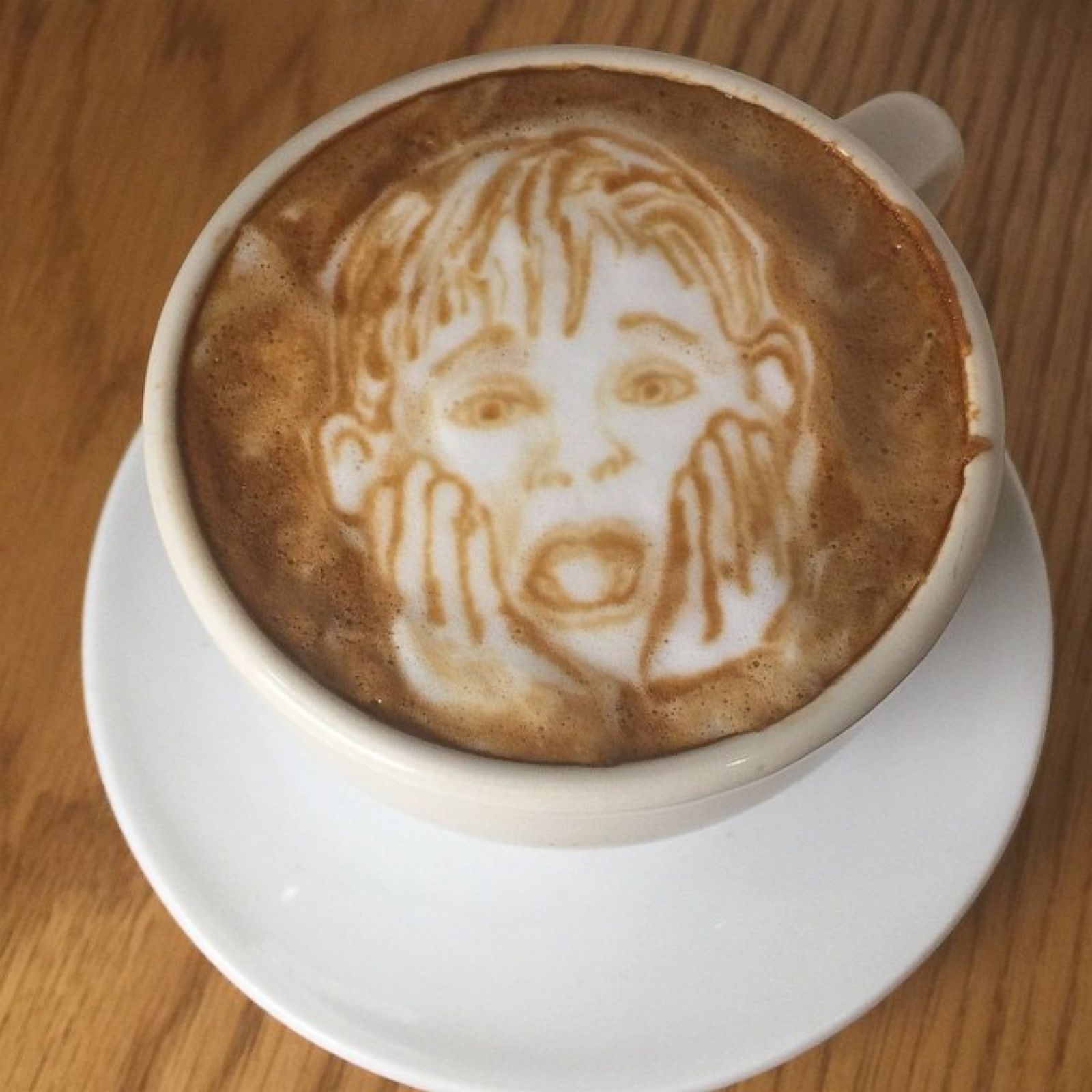 A face in my coffee foam - The Artsology Blog