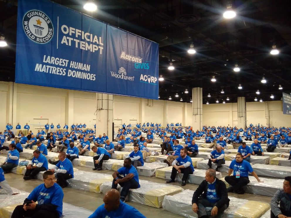 PHOTO: Aaron's Inc. broke the Guinness World Record for largest human mattress domino in March. 

