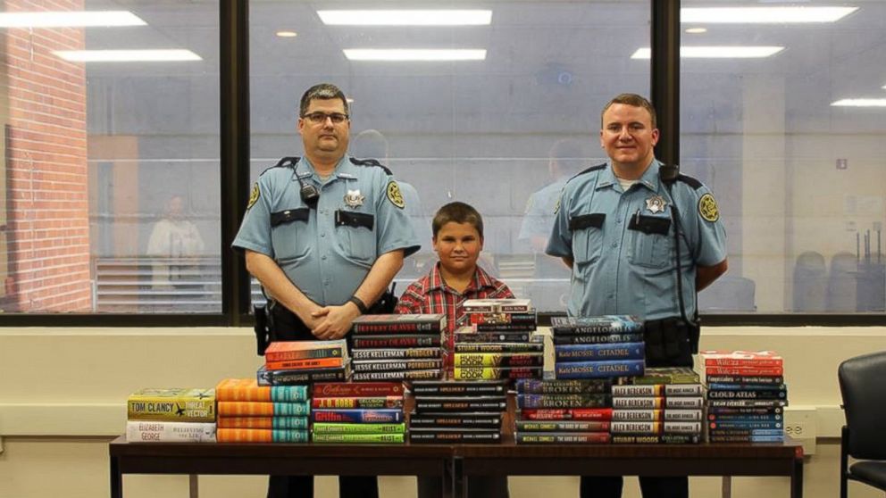 PHOTO:  Tyler Fugett, 9, of Clarksville, Tenn., saved his allowance to purchase books for a local jail.