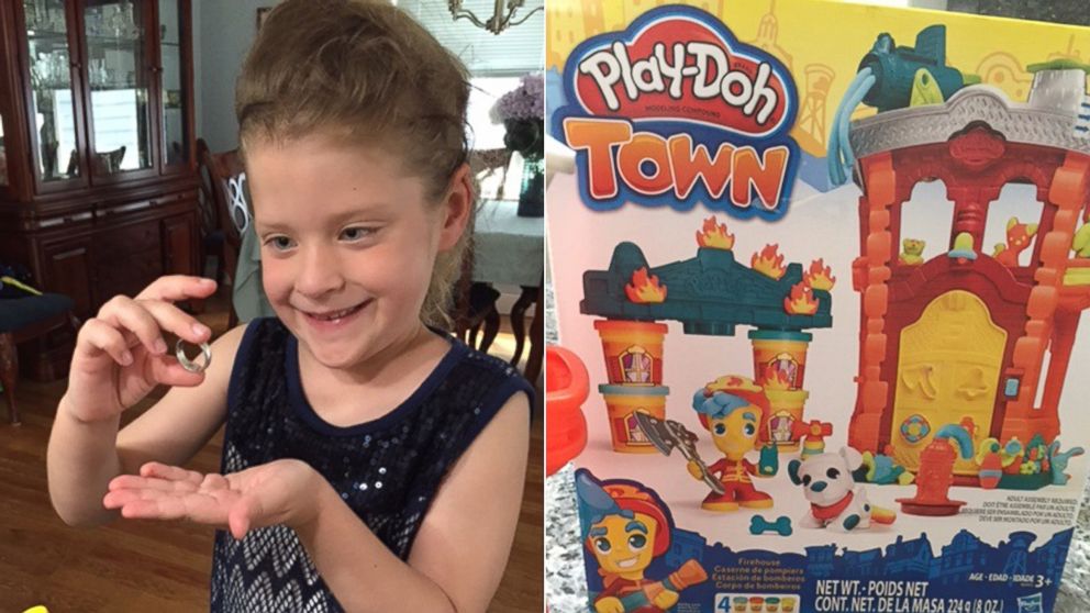 Little girl finds wedding band in bottom of packaged Play-Doh box.