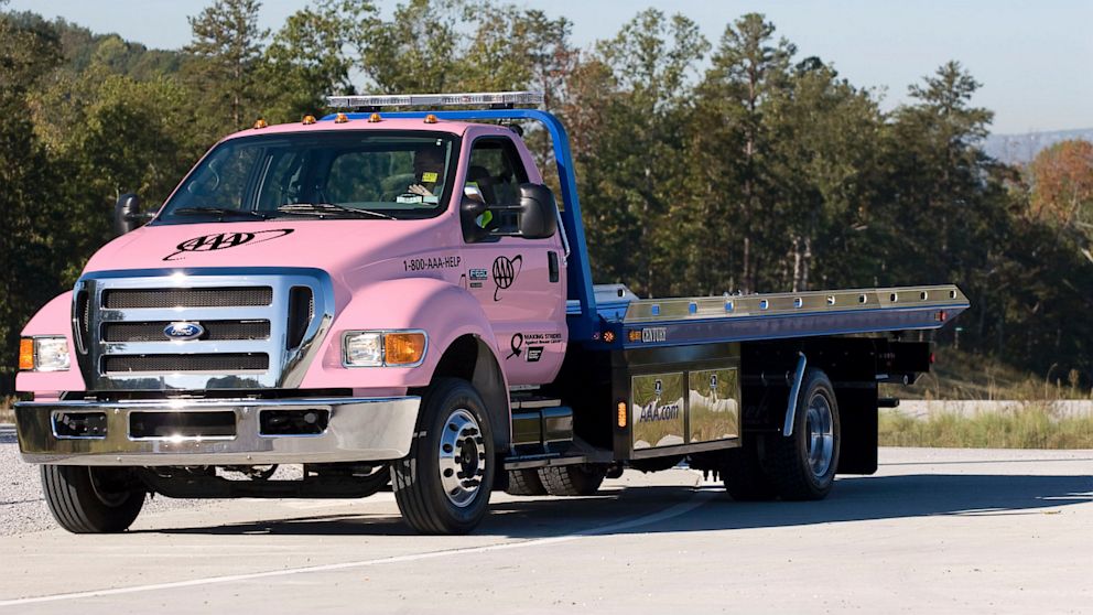 AAA is painting its classic red, white and blue tow trucks the color pink in order to raise awareness of National Breast Cancer Awareness Month.  