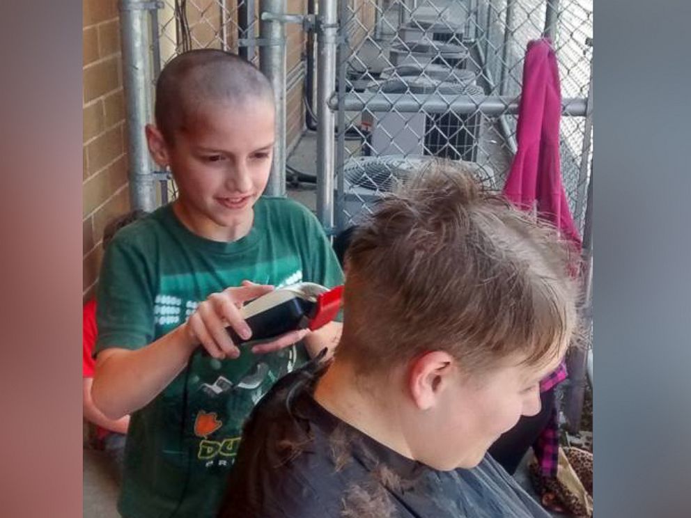 PHOTO: Tori Nelson allowed her fourth grade student to shave her head after he was bullied for his haircut.