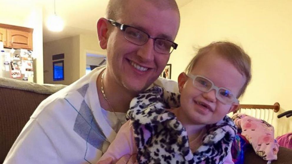 Adam Standiford is pictured with his six-year-old daughter, Savannah.