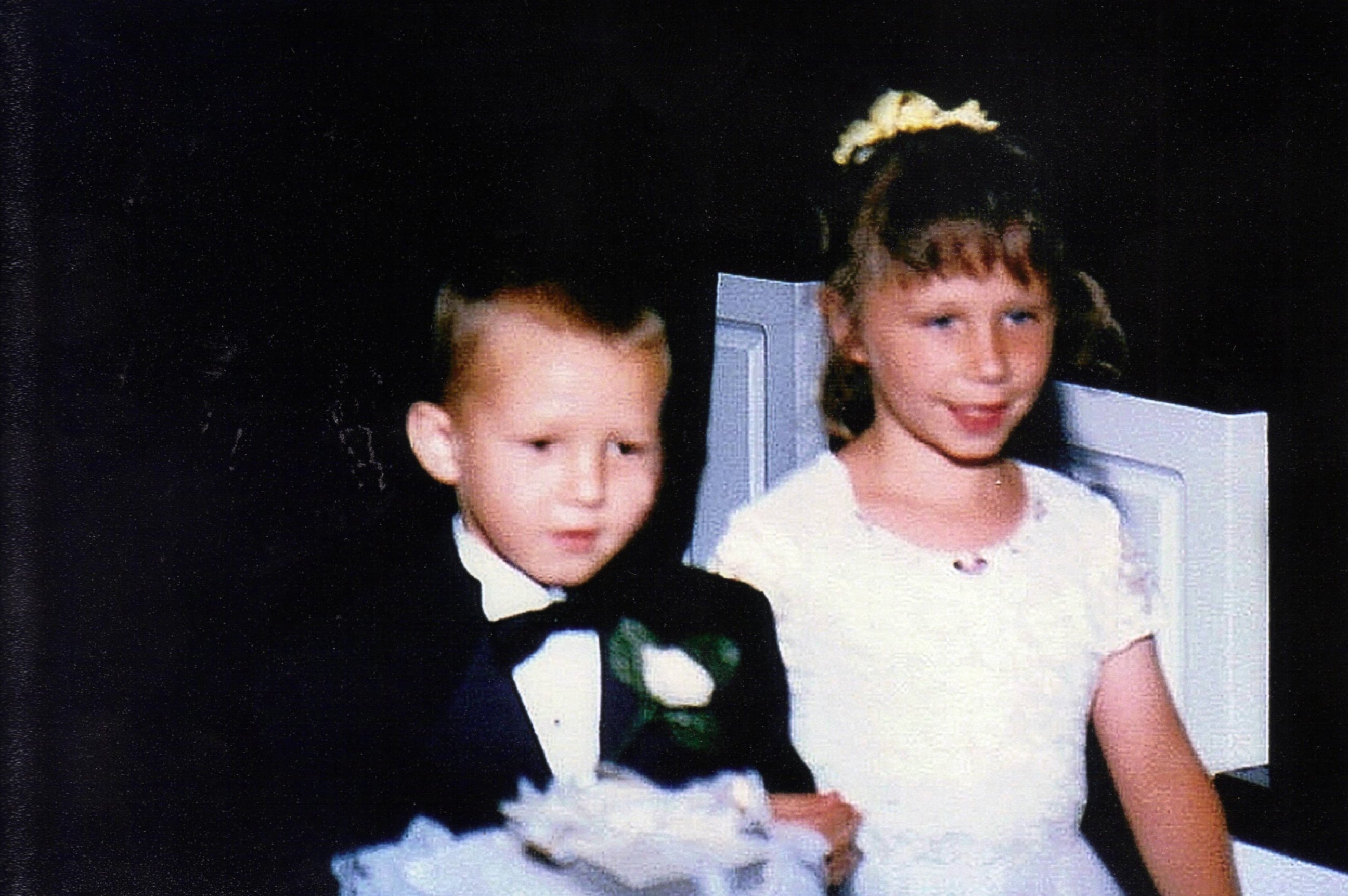 PHOTO: The two walked in a wedding party together as children in 2001. 