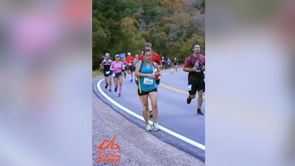 This photo of Anna Young breastfeeding while running a half-marathon has gone viral.