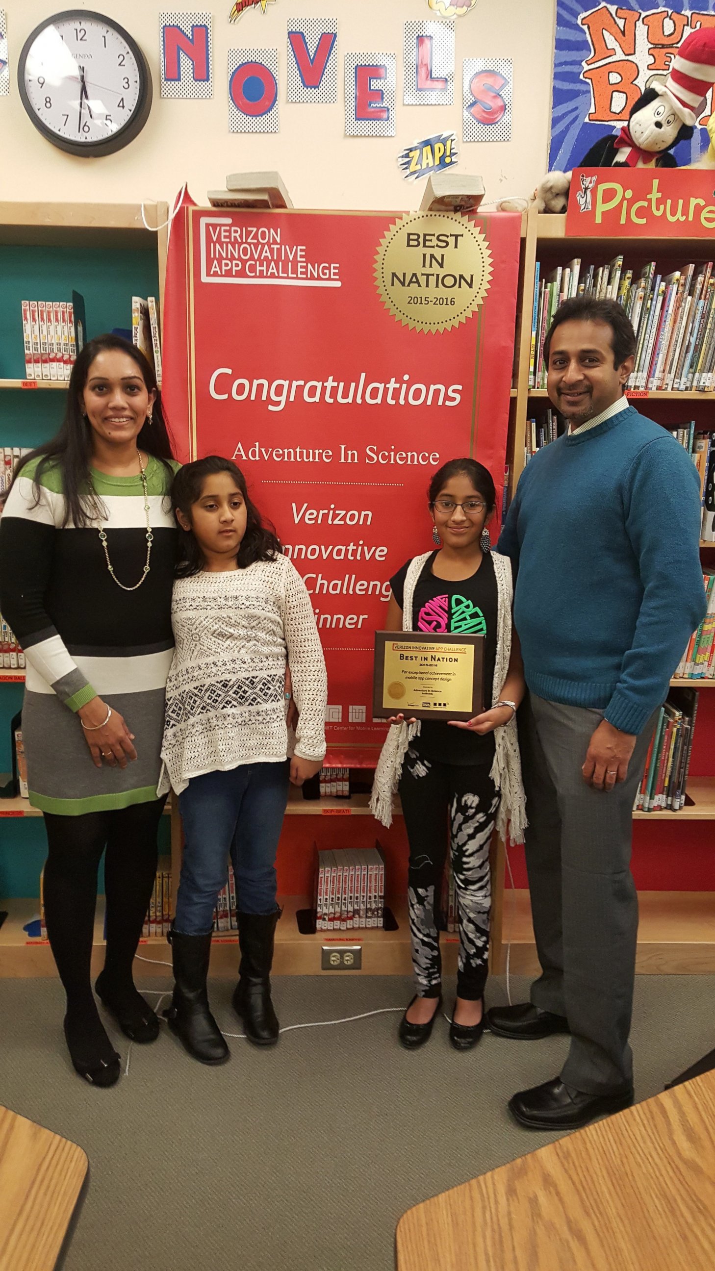 PHOTO: Eashana, 12, and Meghana Subramanian, 9, with their parents after AutBuddy won the 2016 Verizon App Challenge.