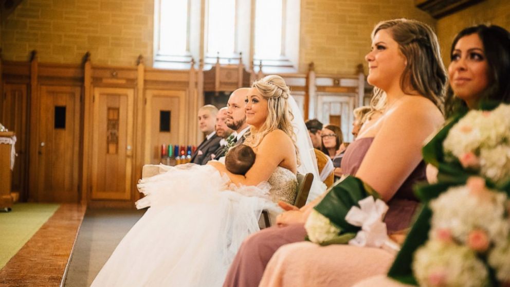 Christina Torino-Benton's viral photo of her breastfeeding her daughter, Gemma, during her wedding ceremony, has gone viral. 