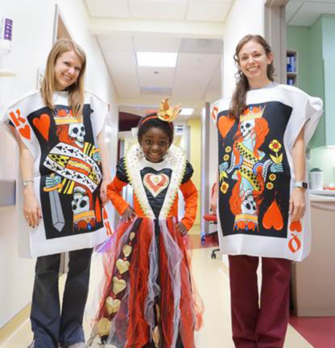 PHOTO: Kambria, 8-year-old patient, ruled her nurse Stacey and child life specialist Jessica as the Queen of Hearts.