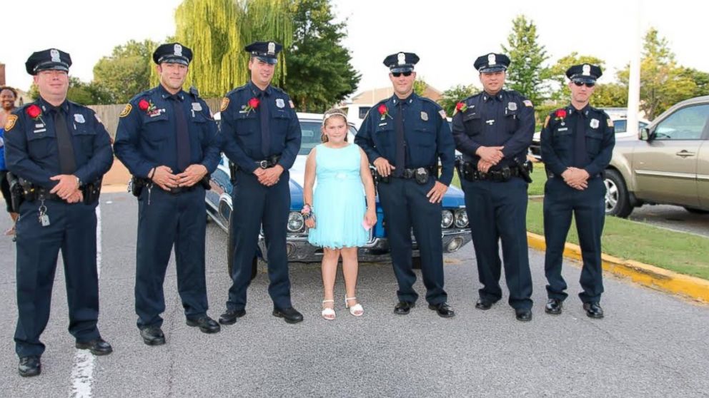 Officers from the Memphis Police Department escorted the daughter of a fallen officer to her school's father-daughter dance.