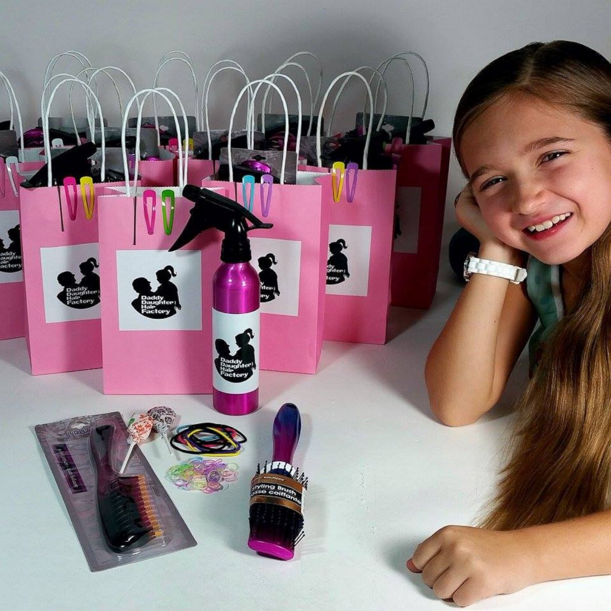 PHOTO: Emma Morgese poses in front of the "Daddy Daughter Hair Factory" goody bags.