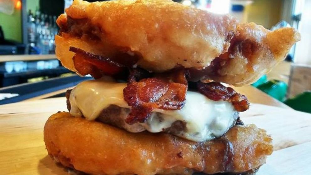 The restaurant PYT in Philadelphia has unleashed its latest over-the-top creation--The Deep-Fried Twinkie Burger.