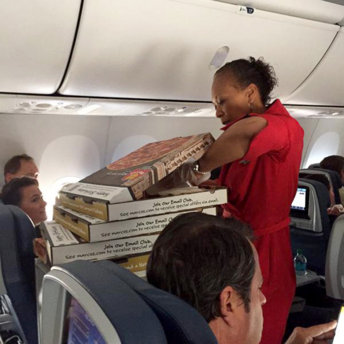 PHOTO: Delta threw passengers a pizza party after flight was rerouted. 