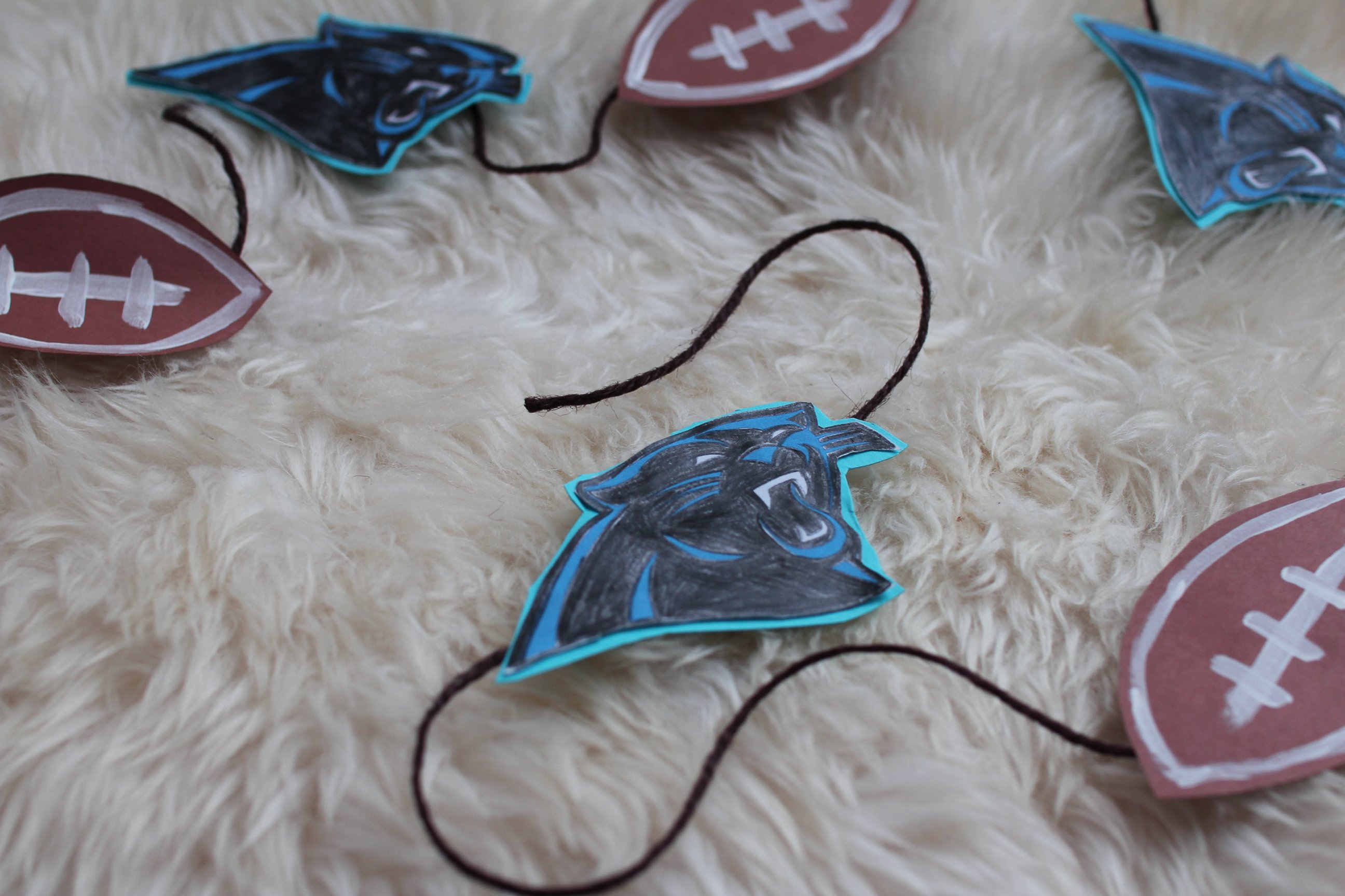 PHOTO: Mariah Robinson created a Carolina Panthers-themed football garland, picture here. 