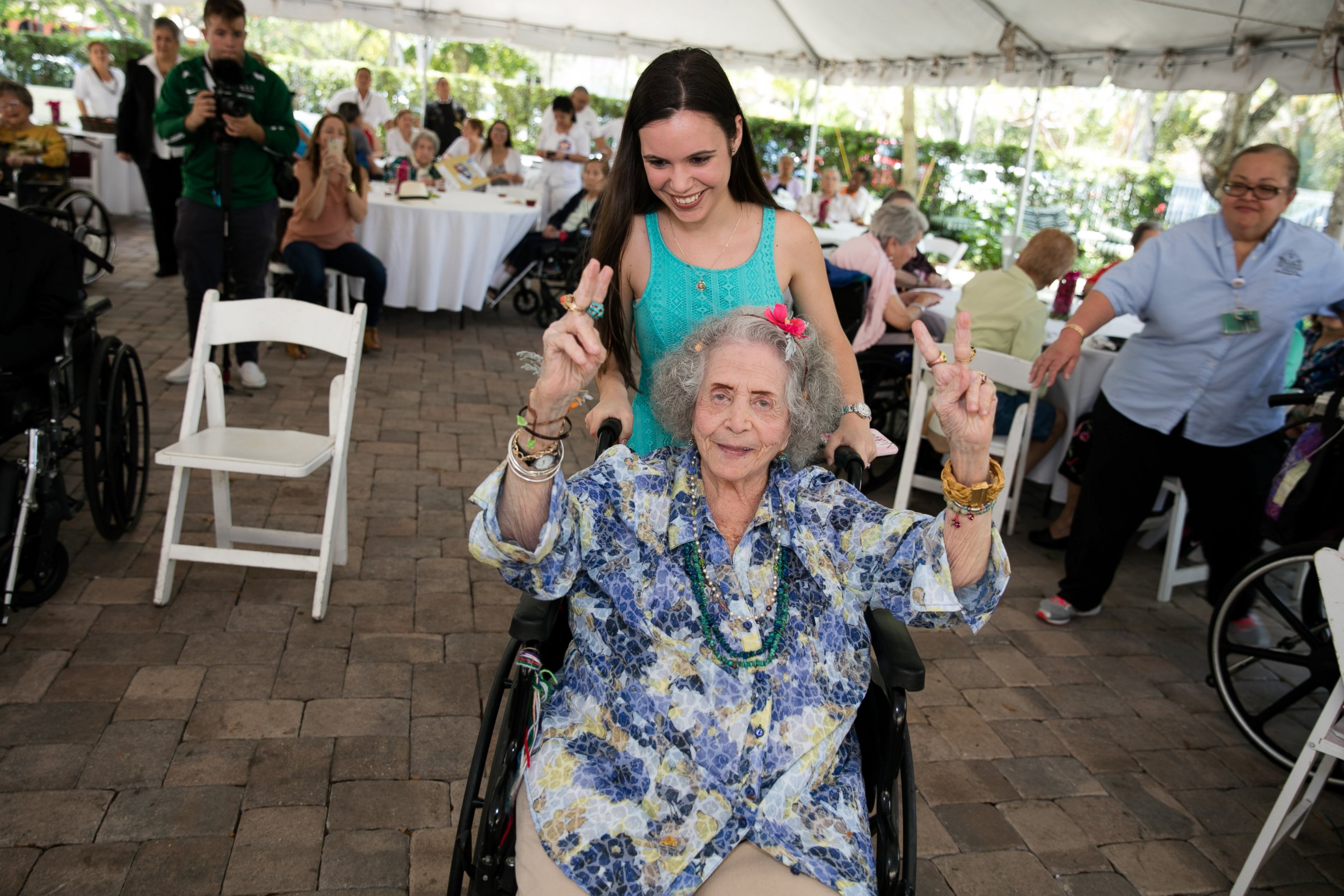 PHOTO: Students at the TERRA Environmental Research Institute in Miami, Florida hosted a "senior" prom for the elderly residents at The Palace Nursing & Rehab Center, April 21, 2016. The prom included music and dancing, food and prom portraits. 
