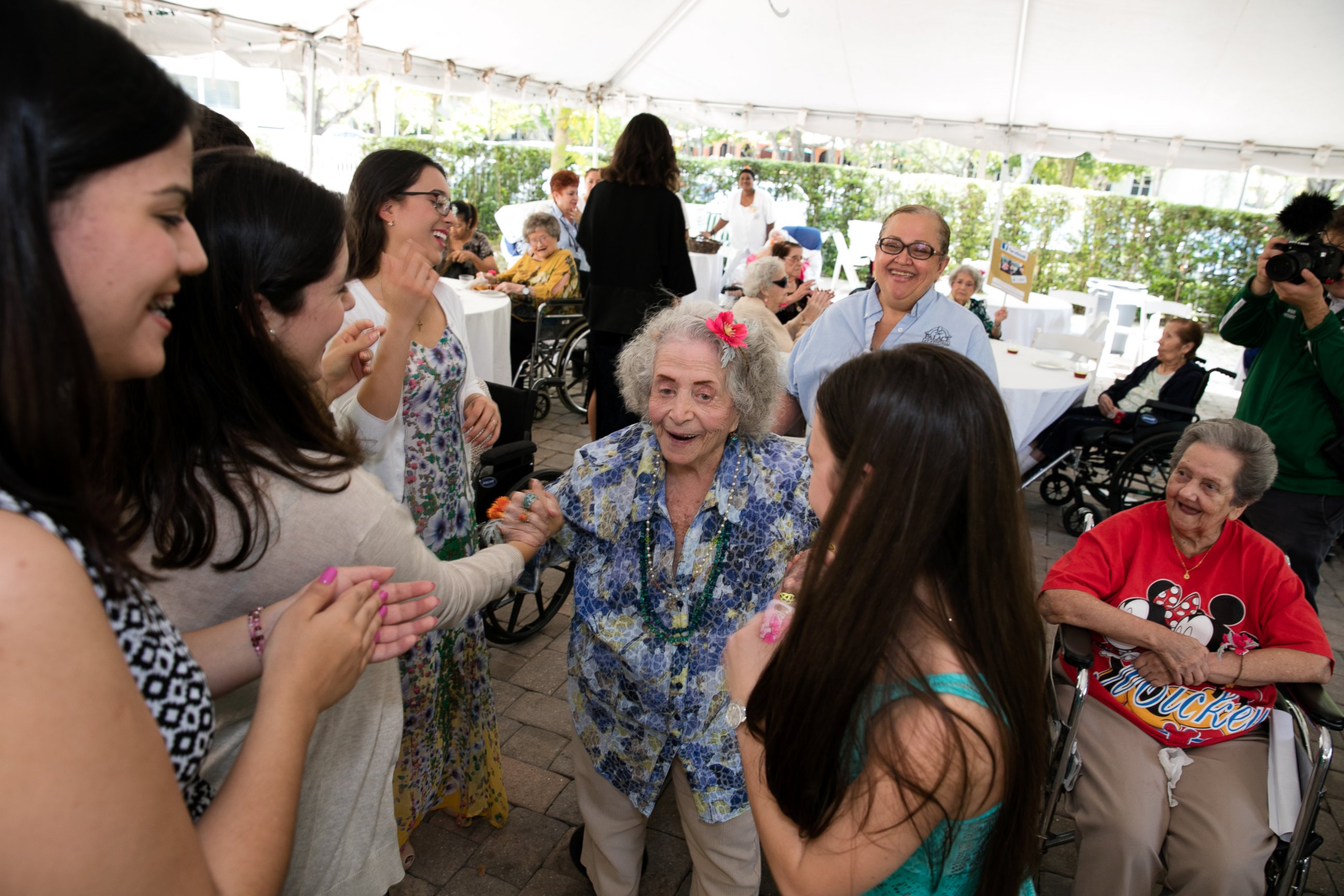 PHOTO: Students at the TERRA Environmental Research Institute in Miami, Florida hosted a "senior" prom for the elderly residents at The Palace Nursing & Rehab Center, April 21, 2016. 
