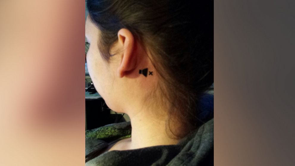 PHOTO: Elisa Menzel's tattoo behind her left ear, telling strangers she's deaf in one ear, has gone viral.