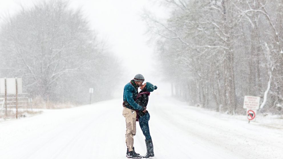 PHOTO: Felicia Sam and David Nartey braved the snow in Fort Meade, Maryland to capture the perfect shot for their engagement photos.