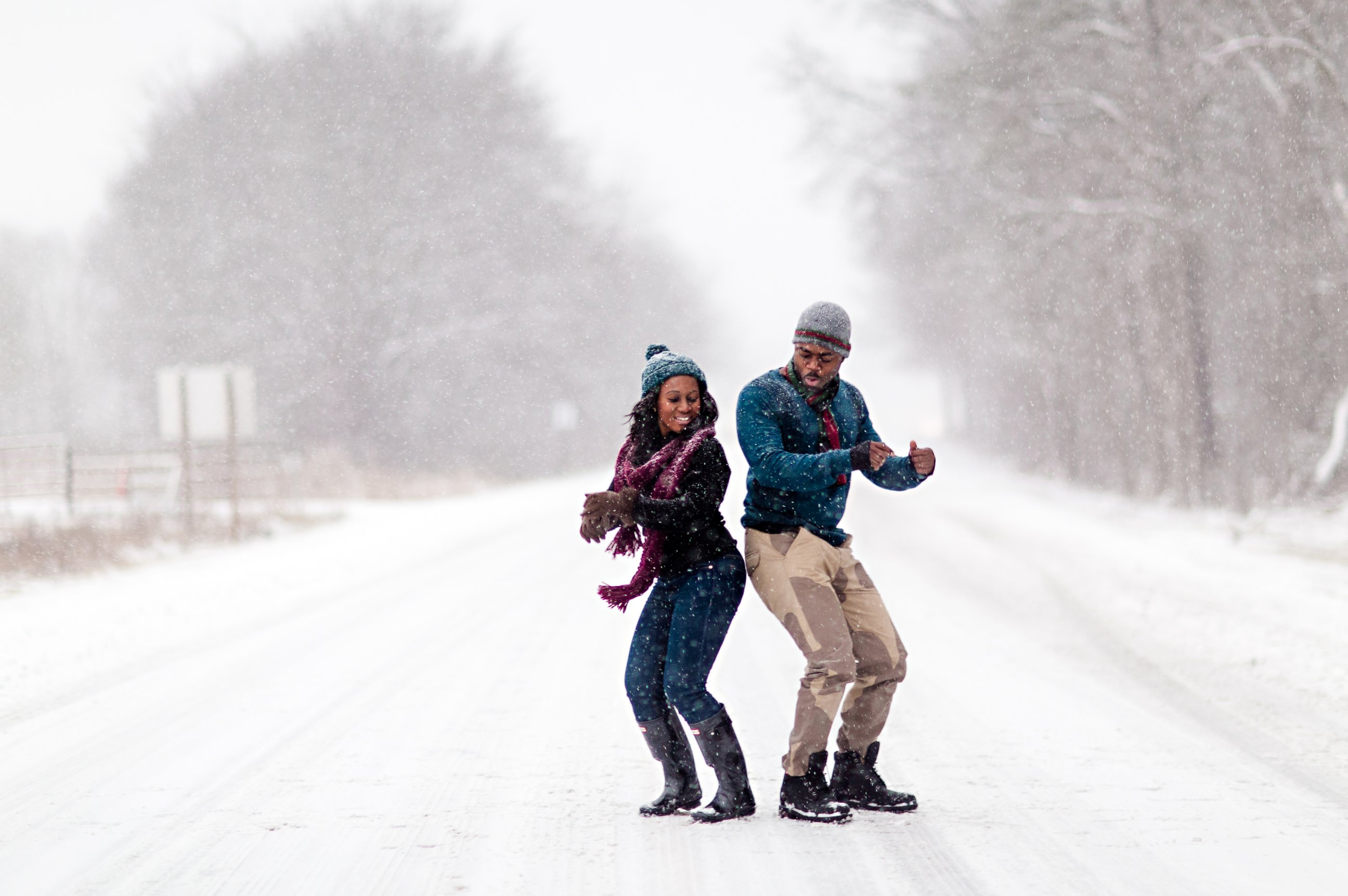 PHOTO: Felicia Sam and David Nartey braved the snow in Fort Meade, Maryland for wintery engagement photos.