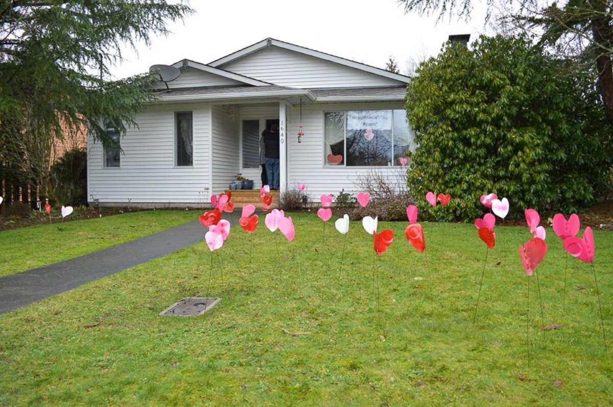 On Feb. 12, 70 kids of Highland Secondary School surprised Tinney with Valentine's that they placed on her front lawn. 