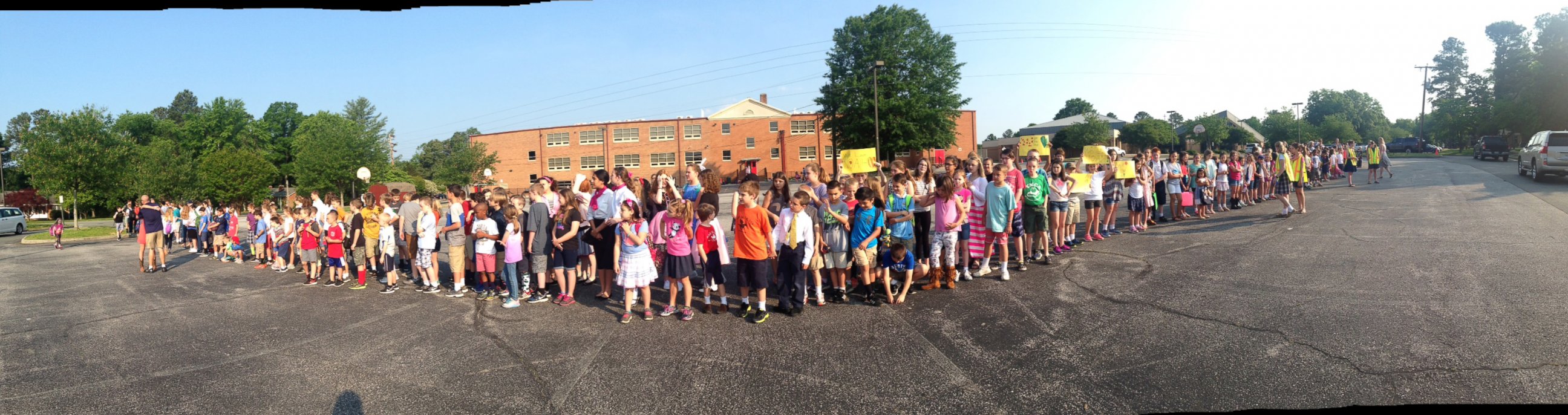 PHOTO: The children of St. Edward-Epiphany Catholic School in Richmond, Virginia seen lined up on May 23 during the fundraiser, "Buzz Cuts for Noah" in honor of 2nd grader Noah Cross, , who was diagnosed with cancer on May 11. 