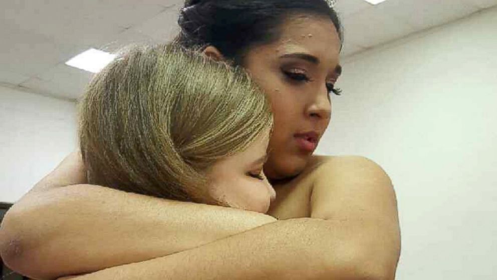 Monique Salinas, 15, meets Aubrey at her March 5 quinceanera in Benavides, Texas. 