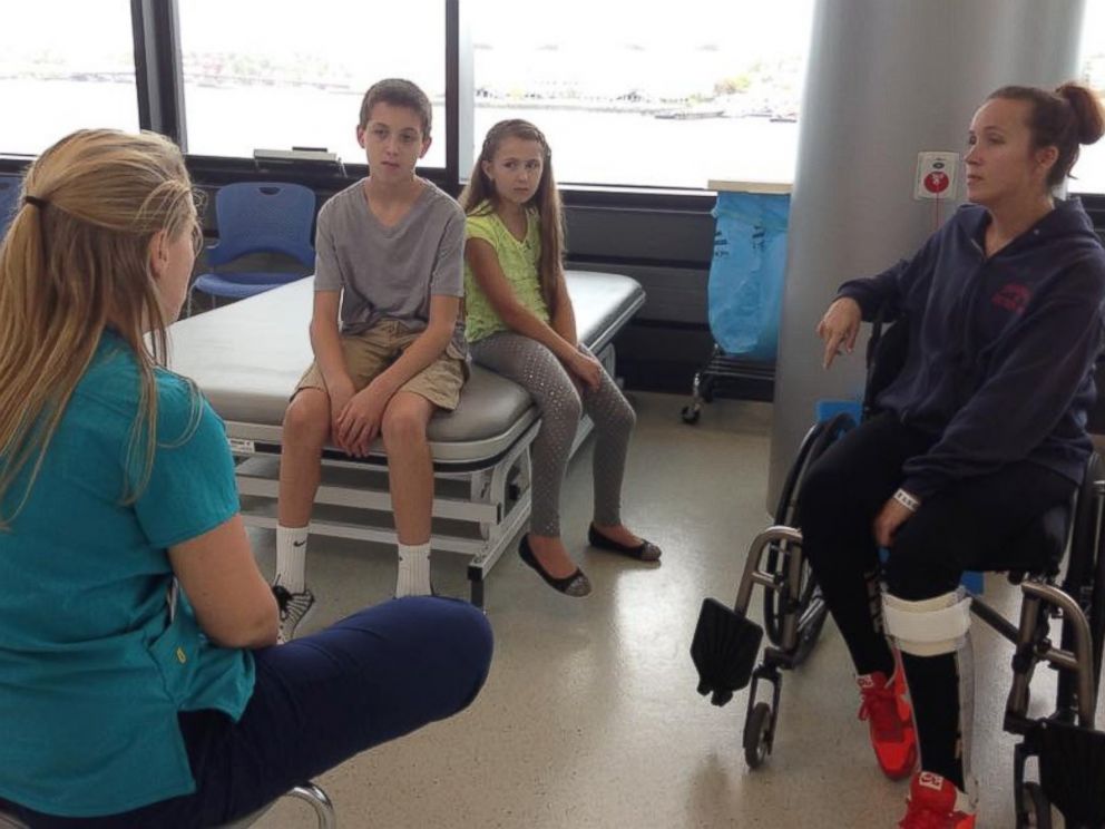 PHOTO: Carnucci with her children at the recovery center.