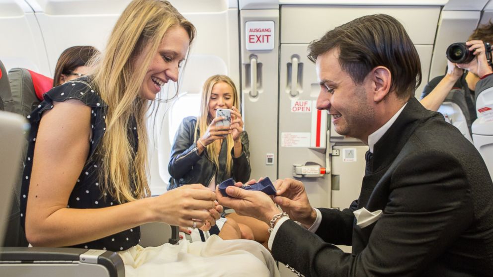 Jurgen Bogner proposed to his now wife Nathaly Eiche while flying to Greece. He then asked her to marry him right on the plane!