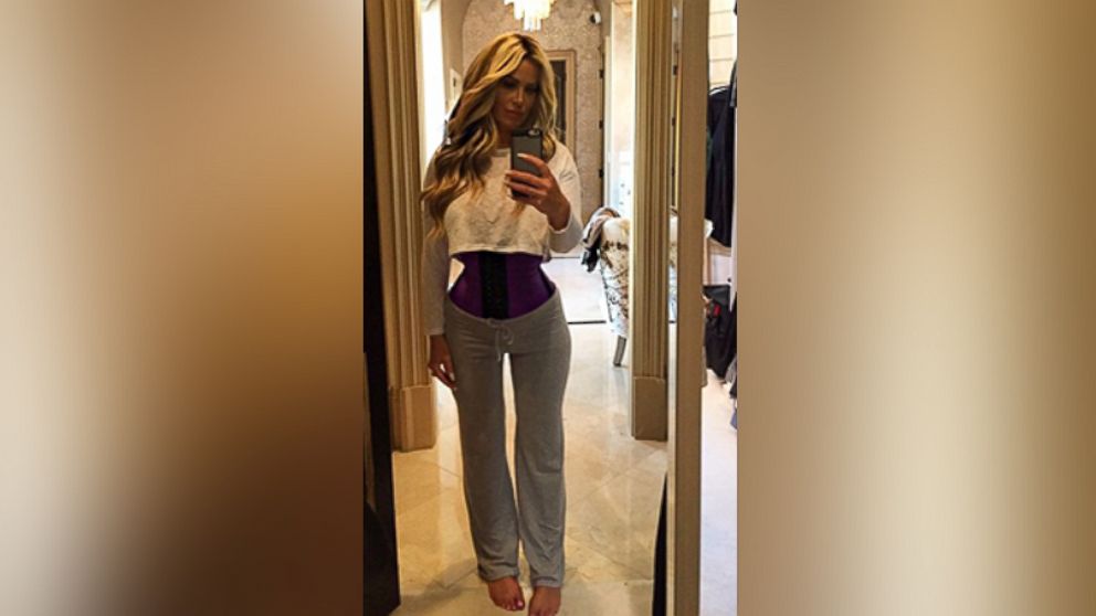 Kim Zolciak is shown wearing a waist trainer in this Instagram photo she posted on June 8, 2105.