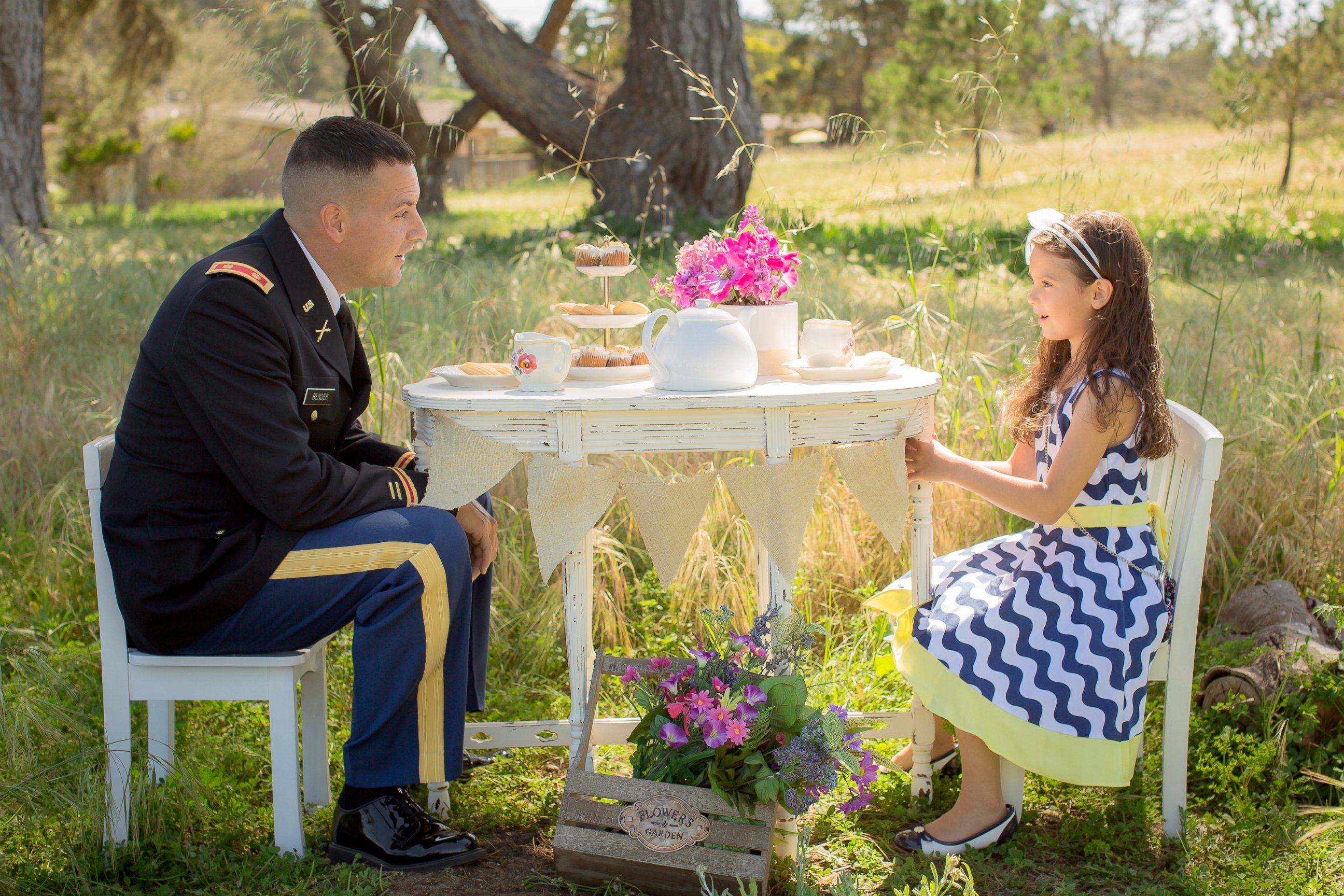PHOTO: Professional photographer Vanessa Hicks captures military personnel with their children in her popular "Military Tea Time Mini Sessions."