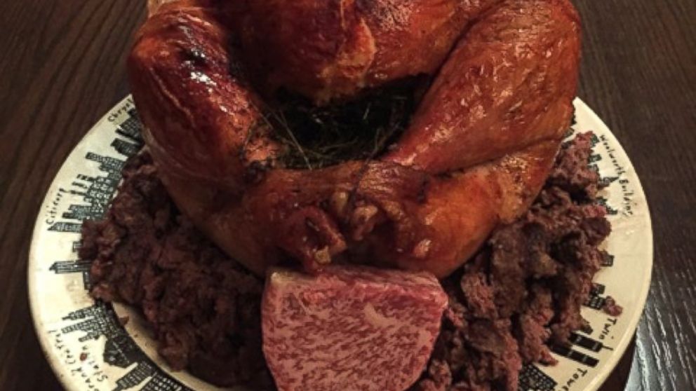 Roasted farm raised organic turkey stuffed with seven pounds of imported $200/lb. prized Japanese Wagyu filet mignon.