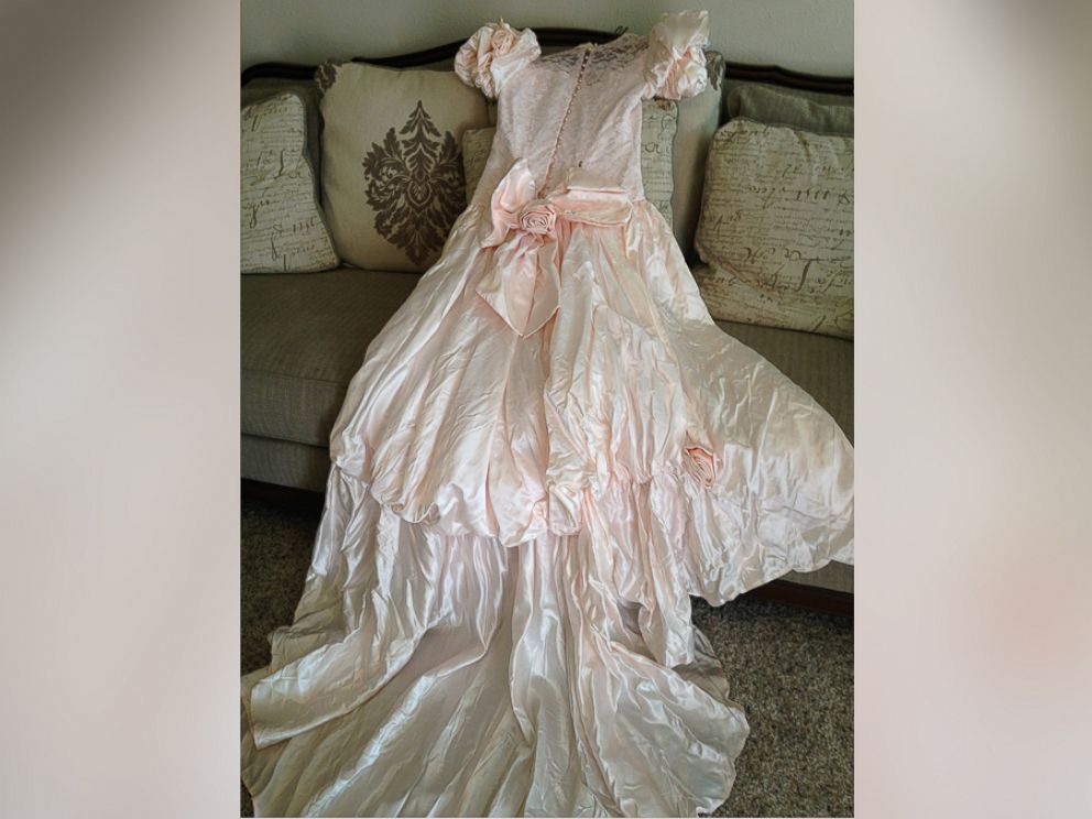 PHOTO: Texas woman, Barbara Haynes, is searching for the owner of this pink wedding gown she found after a tornado hit. 