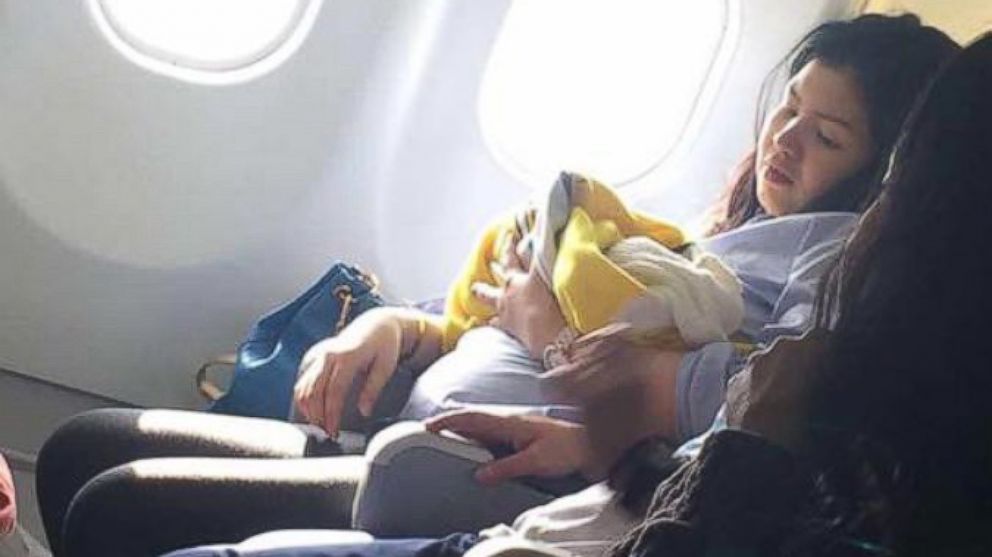 An airline passenger named Missy Berberabe Umandal snapped a woman's photo last week, after she gave birth to a baby girl aboard a Cebu Pacific Air flight from Dubai to the Philippines.