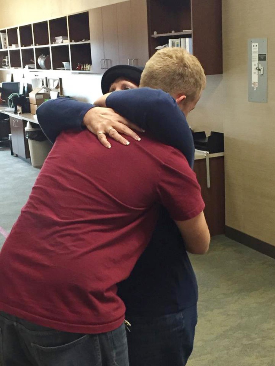 PHOTO: Kerry Huffaker embracing her son Dylan after his invited her to his high school prom. 