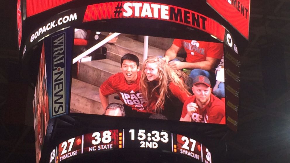 Jesse Jacobs asked his girlfriend, Maddy Comito, to prom on a Jumbotron.