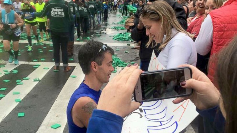 Joe Duarte and Katie Mascenik are on the hunt to find the person who snapped their "perfect" engagement photo at the marathon on Nov. 1, 2015.