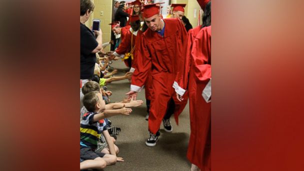 PHOTO: Seniors at Van High School in Texas handed out high fives to elementary school students in now viral photos.